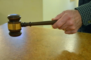 hand holding a gavel